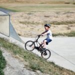 child riding bicycle